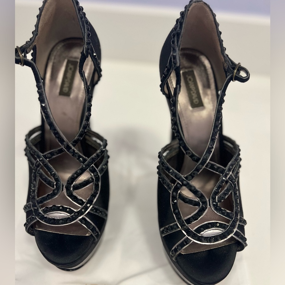 Black platform heels with beaded detail